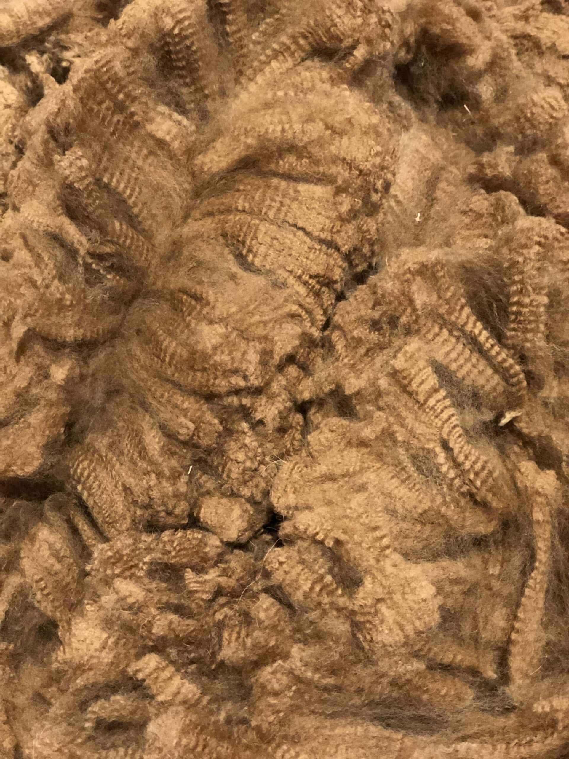 Close-up of textured brown wool fibre